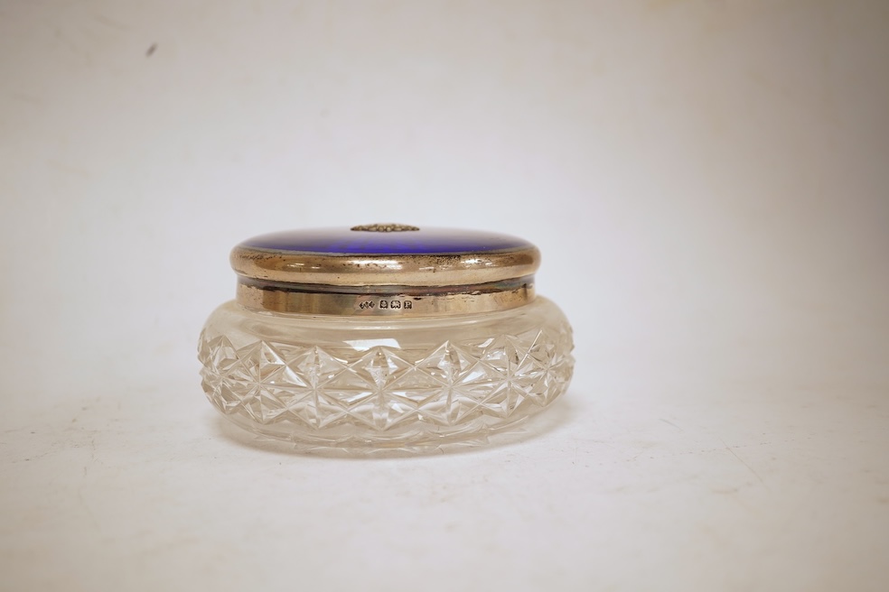 A George VI silver and enamel lidded circular glass powder bowl, John William Barrett, Birmingham, 1939, diameter 12.2cm.